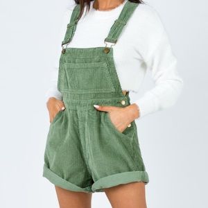Green overall shorts